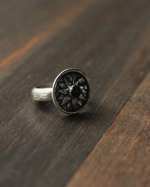 The Flower Keeper Ring in Sterling silver and Garnet