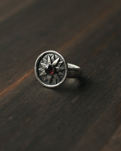 The Flower Keeper Ring in Sterling silver and Garnet
